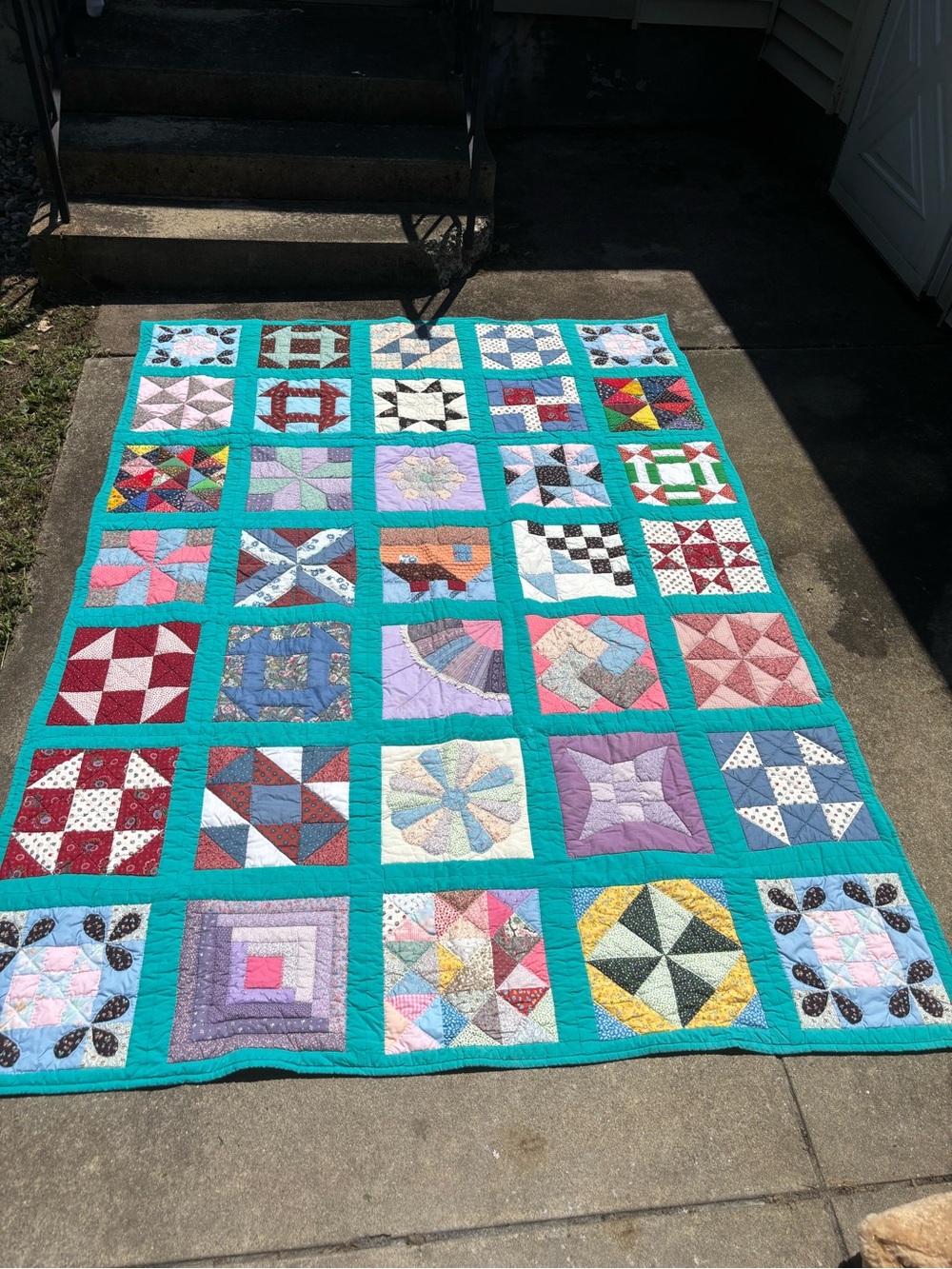 Handmade Patchwork Quilt in Teal and Multicolor Blocks